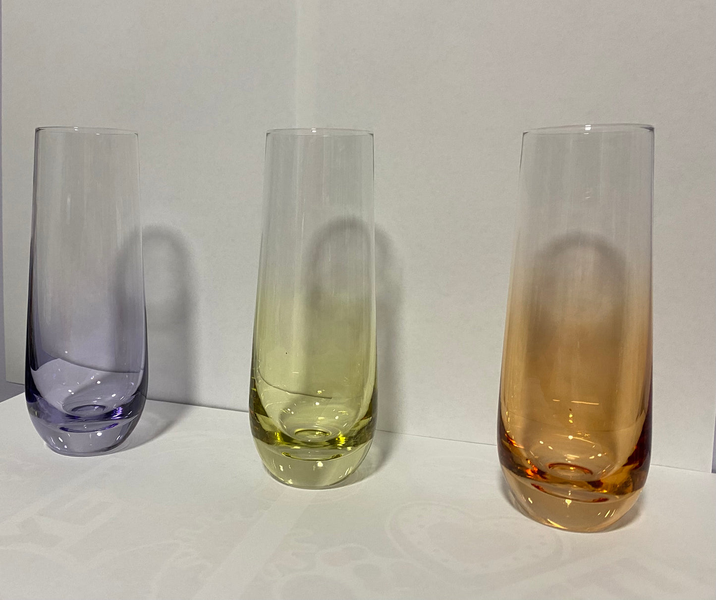 champagne stemless glasses with colored bottoms